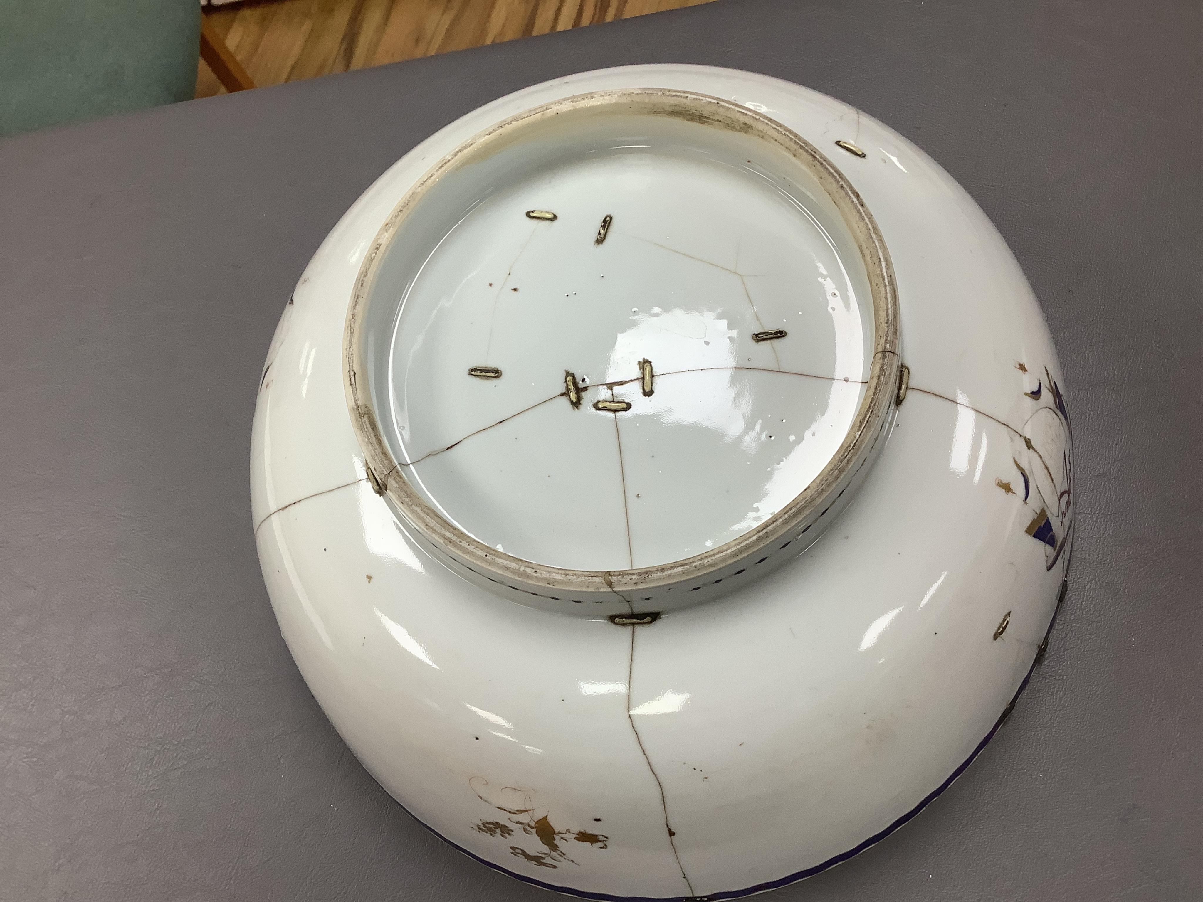 An 18th/19th century Chinese tea bowl and saucer, a punch bowl, two tea bowls and a Paris porcelain vase, largest 31cm